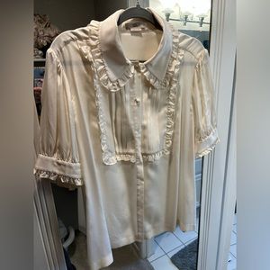 Gorgeous designer blouse from Orla Kiely. Only ever been dry cleaned